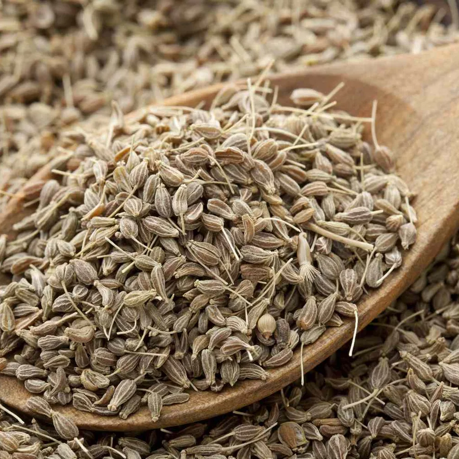 Anise seeds on a wooden spoon
